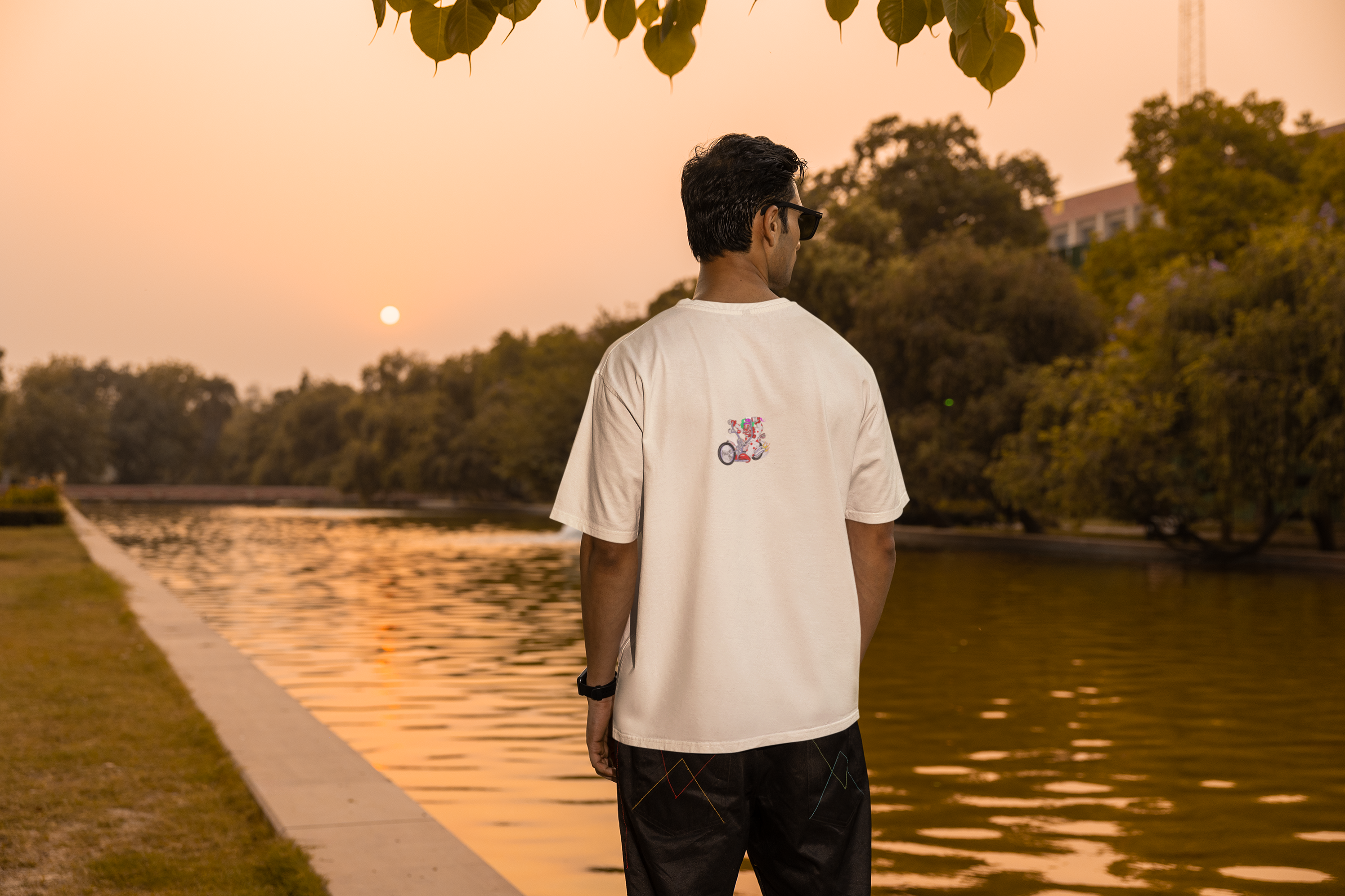 Energetic Clown Riding a Chopper-Style Motorcycle Unisex Oversized Classic T-Shirt