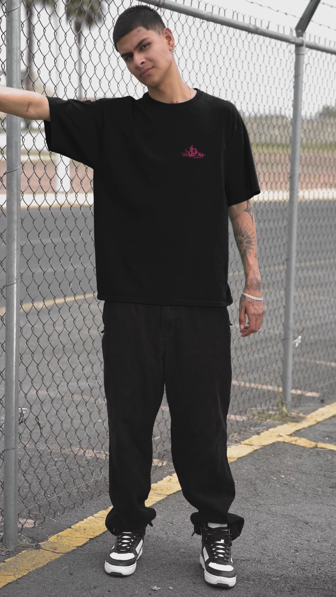 Monochrome Pink Embroidery Design of a Biker Riding a Chopper-Style MotorcycleUnisex Oversized Classic T-Shirt