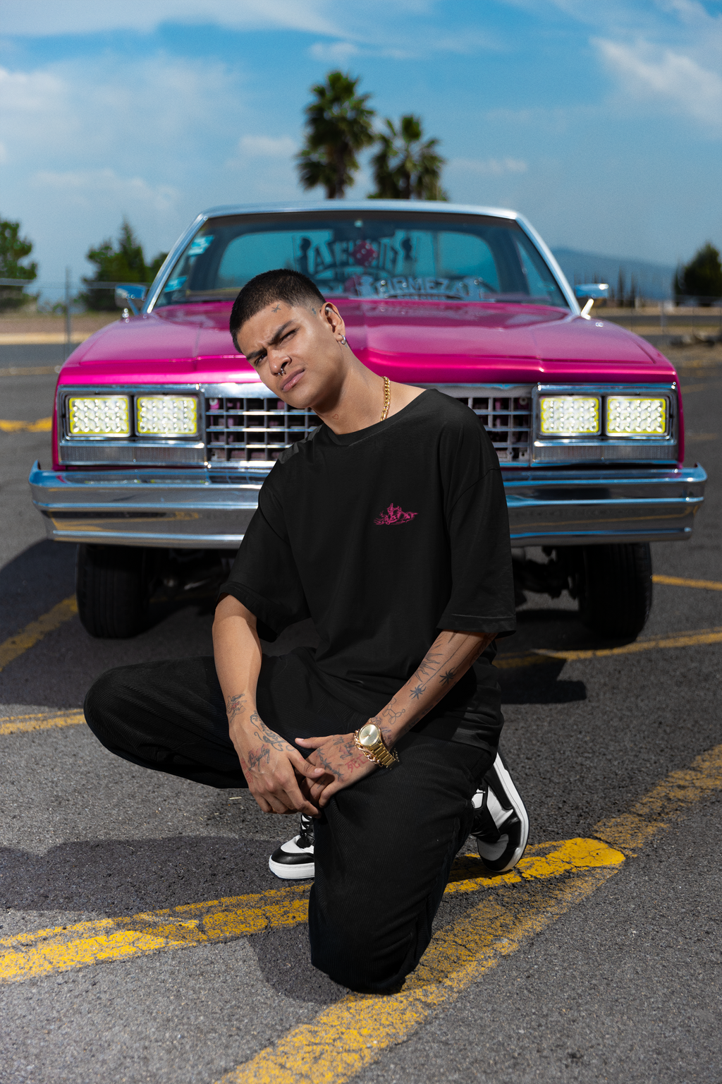 Monochrome Pink Embroidery Design of a Biker Riding a Chopper-Style MotorcycleUnisex Oversized Classic T-Shirt